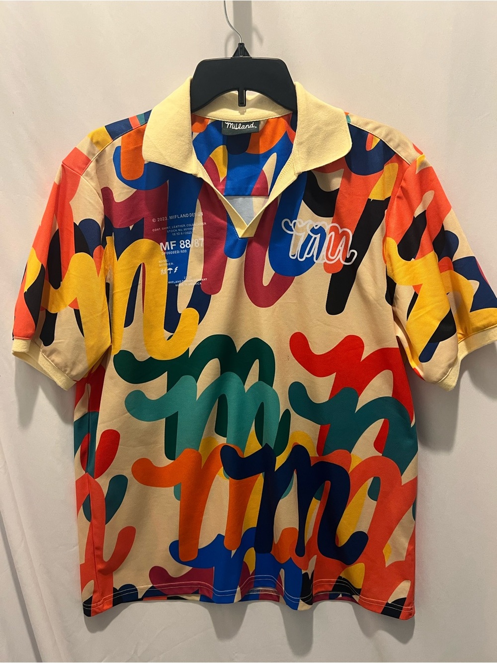 Mifland Multicolor Script-Print Polo Shirt with Cream Collar